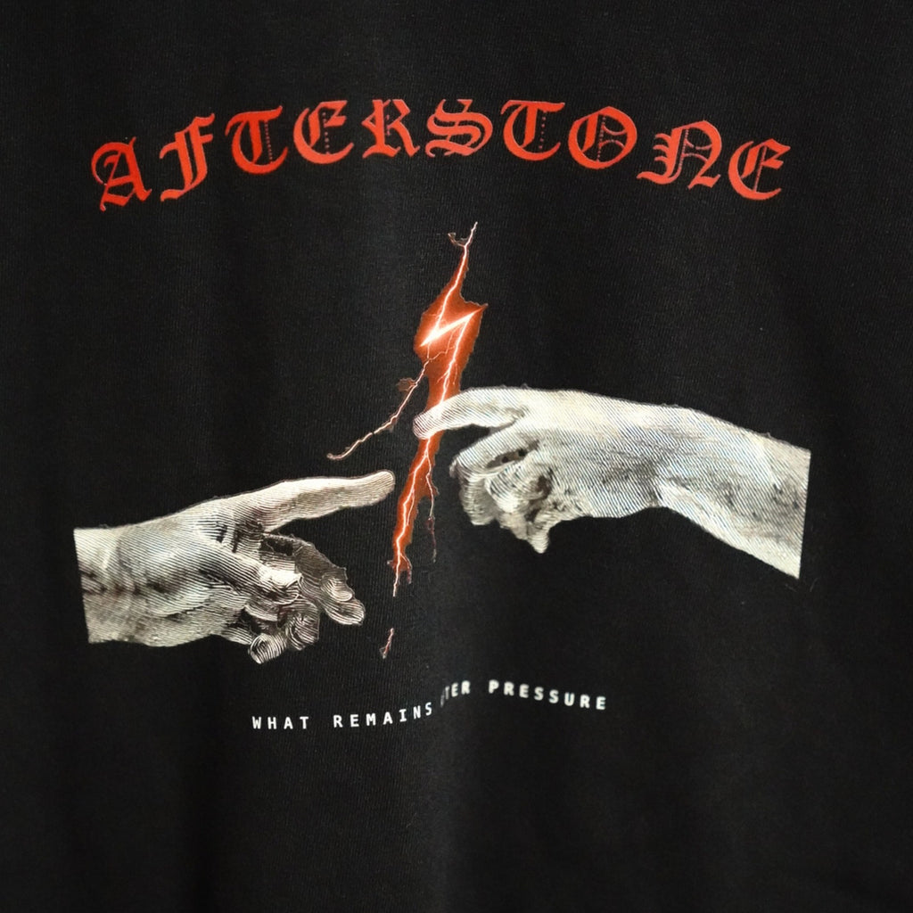 THE GAP chest print detail — hands almost touching, red bolt between them